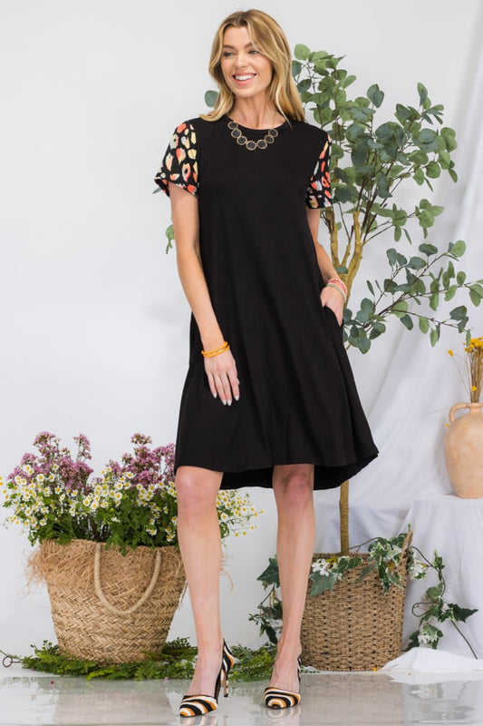 Celeste Full Size Leopard Short Sleeve Dress with Pockets - FunkyPeacockStore (Store description)