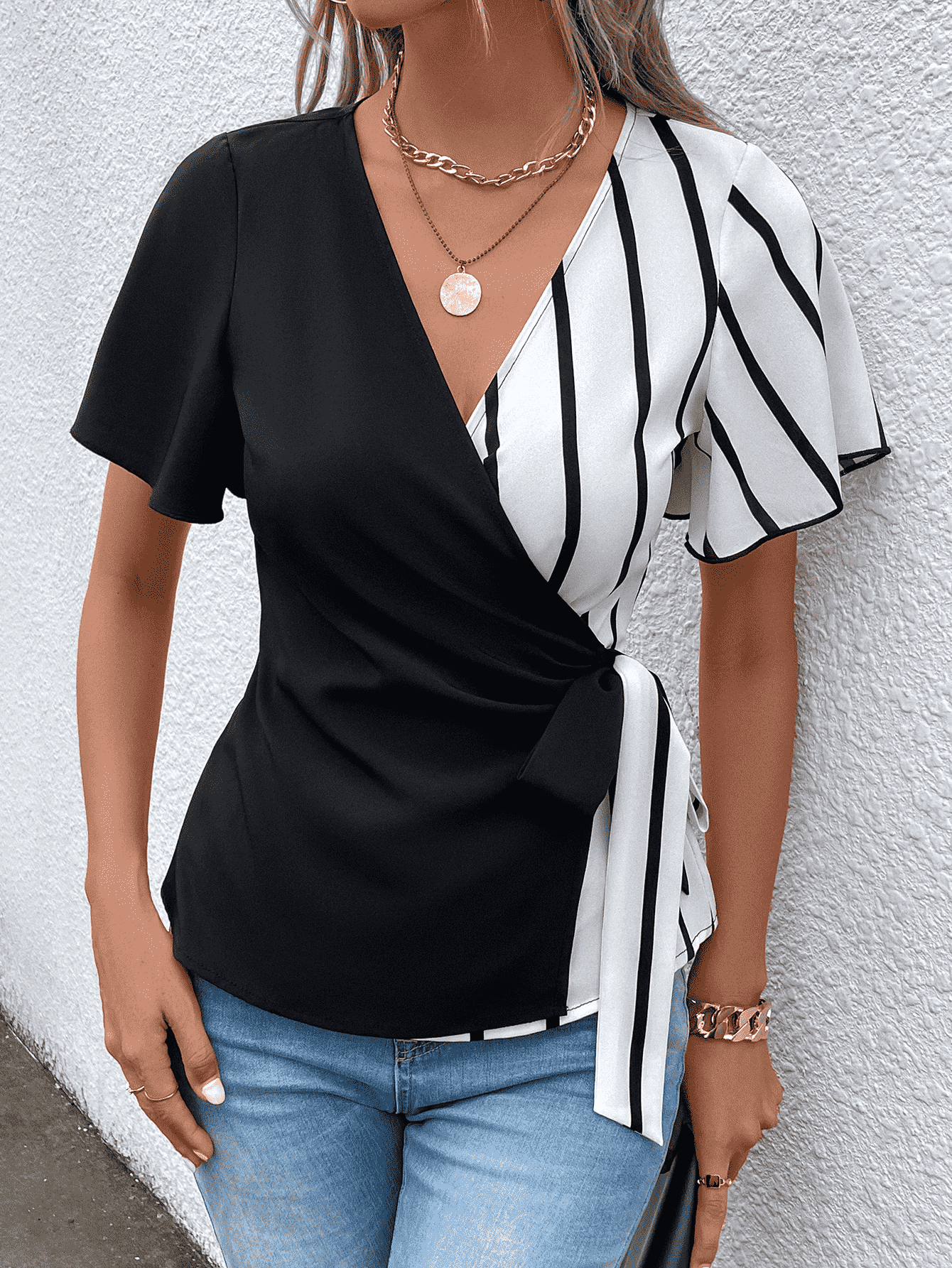 Surplice Neck Waist Tie Flutter Sleeve Blouse - FunkyPeacockStore (Store description)