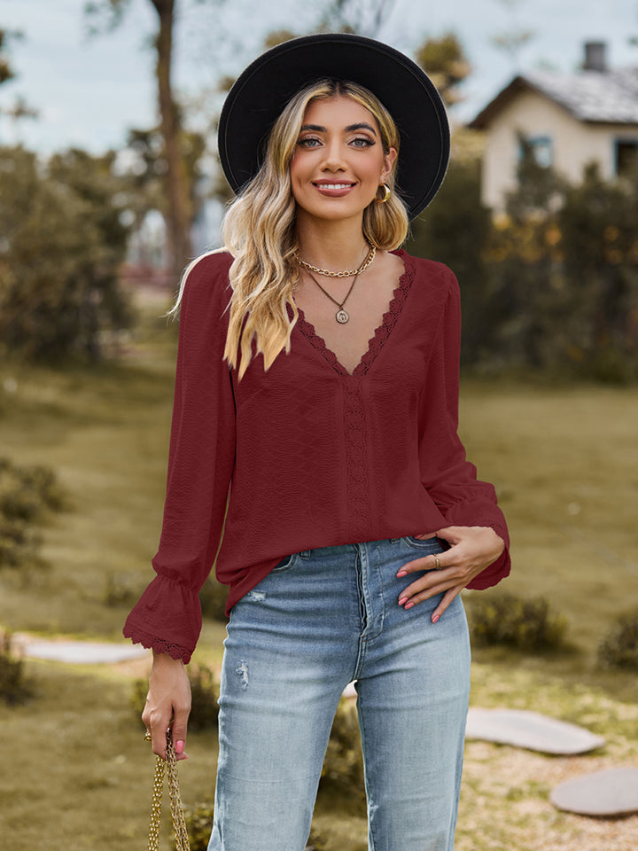 V-Neck Flounce Sleeve Blouse - FunkyPeacockStore (Store description)