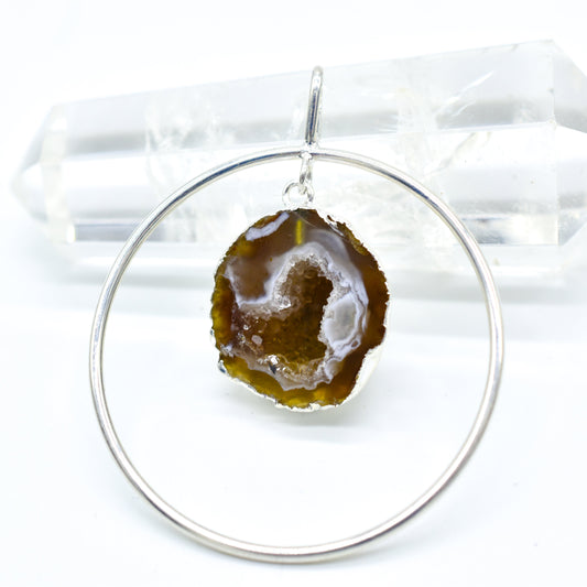 Plated Agate Geodes in Circle Pendant or Necklace - FunkyPeacockStore (Store description)