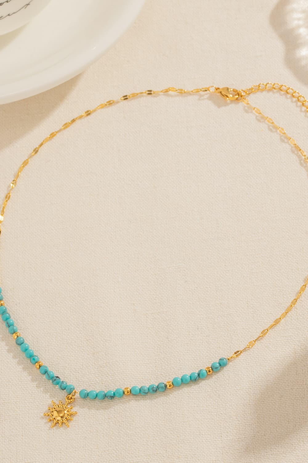 Turquoise Beaded 18K Gold-Pleated Sun Shape Pendant Necklace - FunkyPeacockStore (Store description)