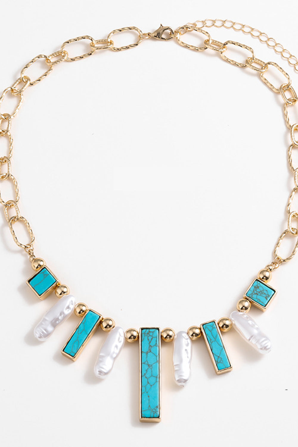 Turquoise Alloy Necklace - FunkyPeacockStore (Store description)