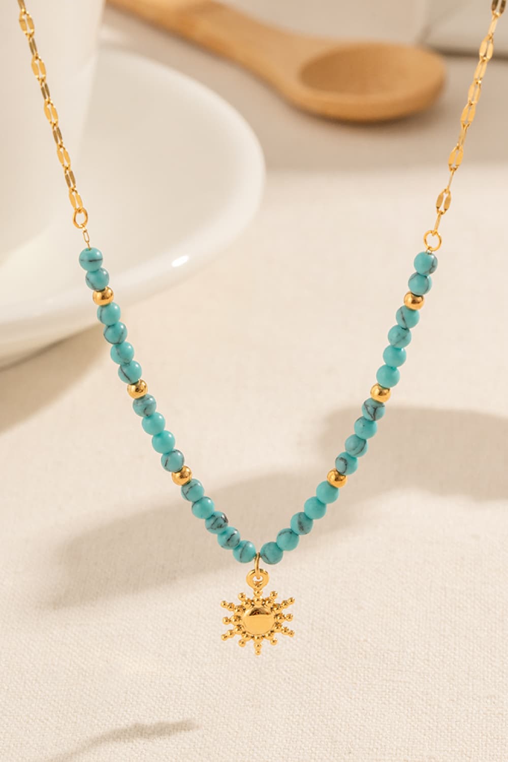 Turquoise Beaded 18K Gold-Pleated Sun Shape Pendant Necklace - FunkyPeacockStore (Store description)