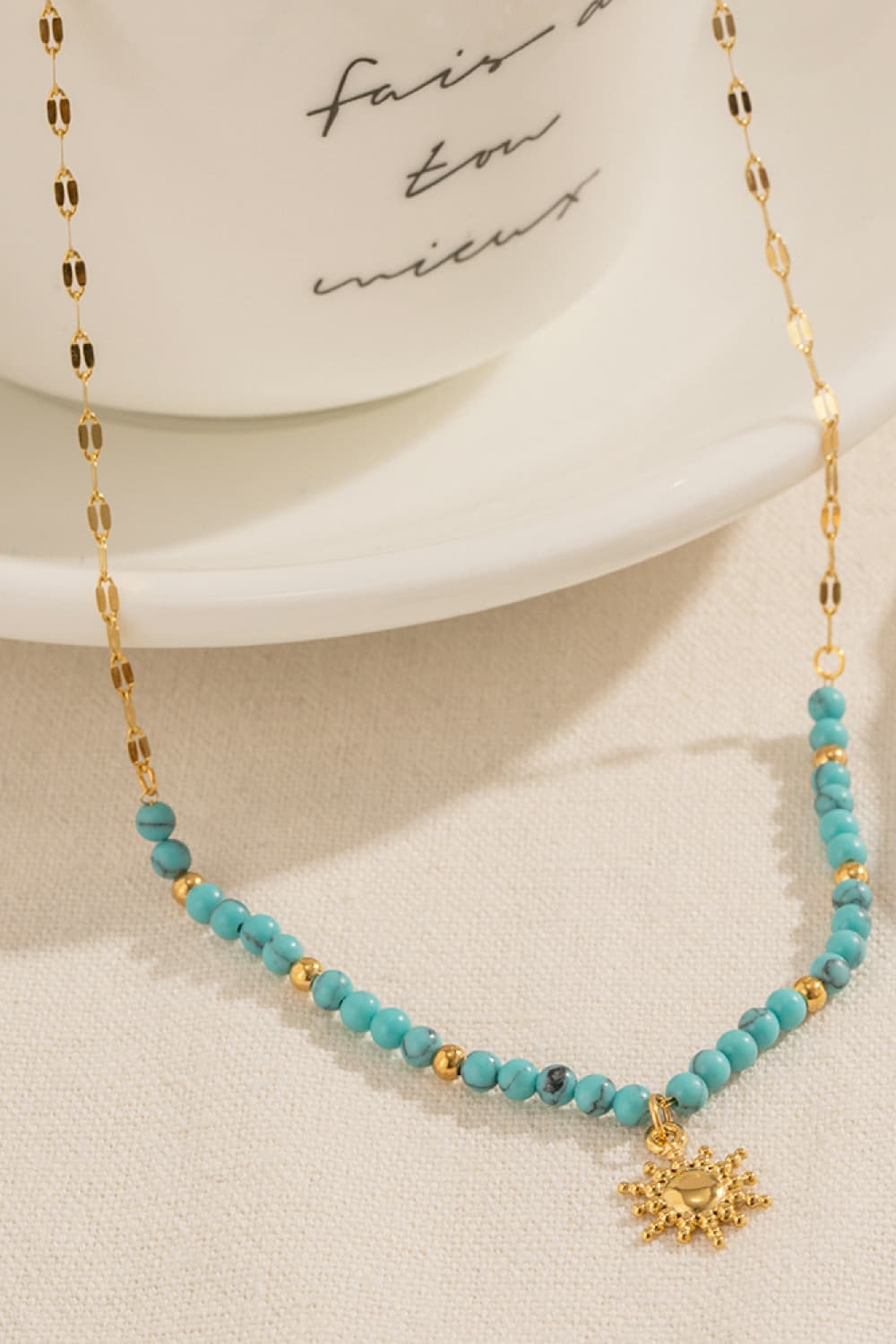 Turquoise Beaded 18K Gold-Pleated Sun Shape Pendant Necklace - FunkyPeacockStore (Store description)