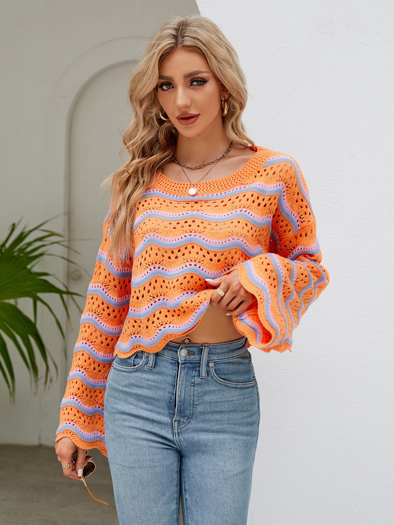 Round Neck Openwork Flare Sleeve Knit Top - FunkyPeacockStore (Store description)