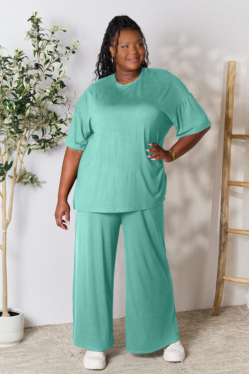 Double Take Full Size Round Neck Slit Top and Pants Set - FunkyPeacockStore (Store description)