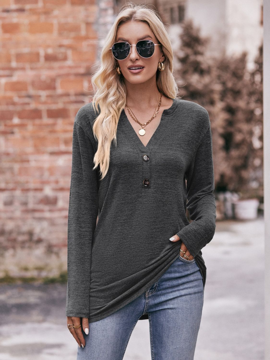 Buttoned Notched Neck Long Sleeve Top - FunkyPeacockStore (Store description)