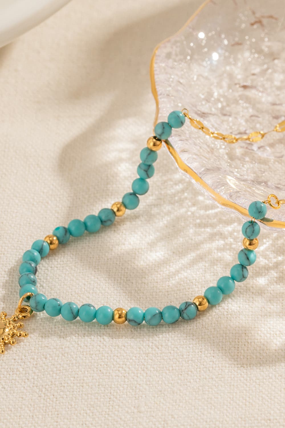 Turquoise Beaded 18K Gold-Pleated Sun Shape Pendant Necklace - FunkyPeacockStore (Store description)