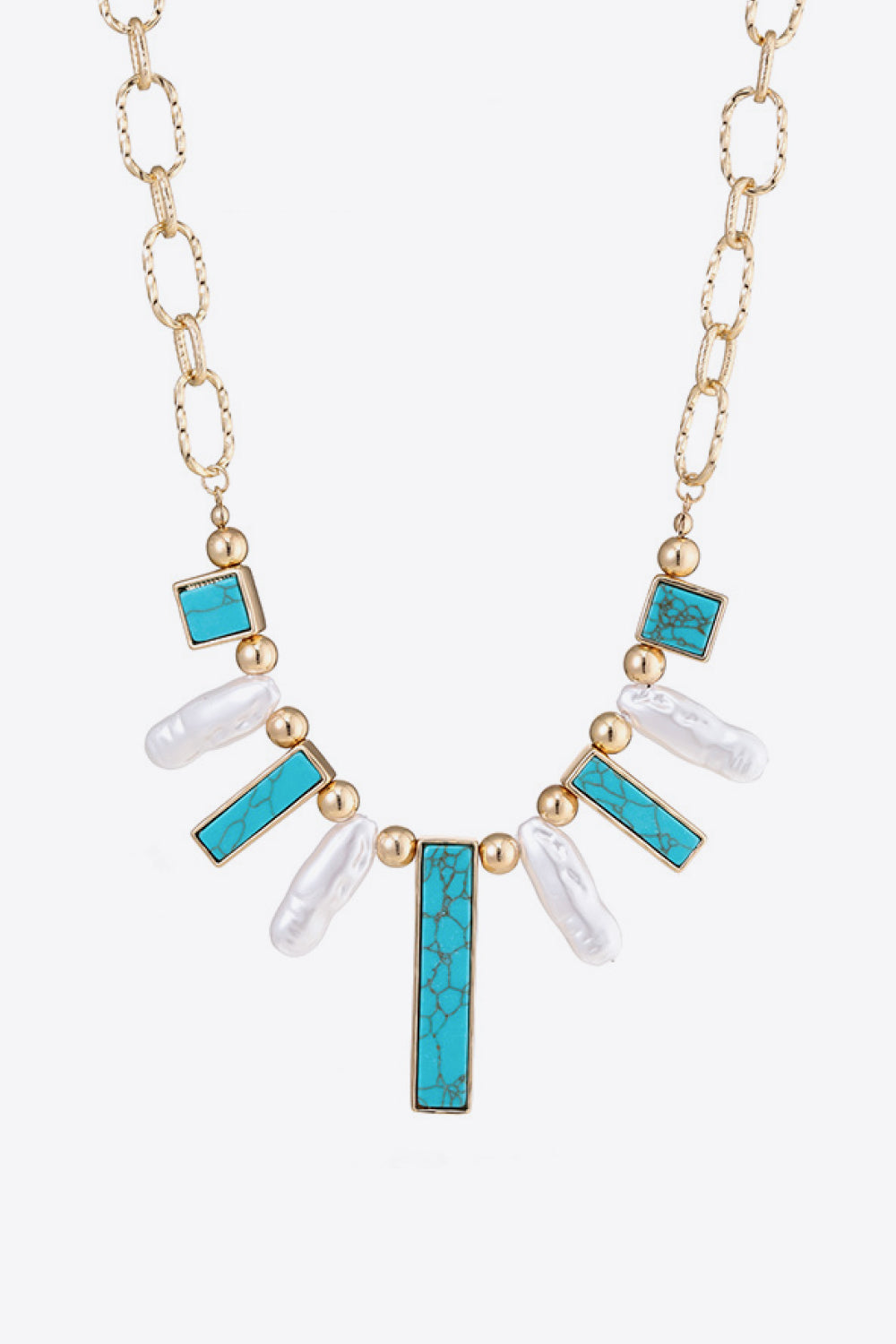 Turquoise Alloy Necklace - FunkyPeacockStore (Store description)