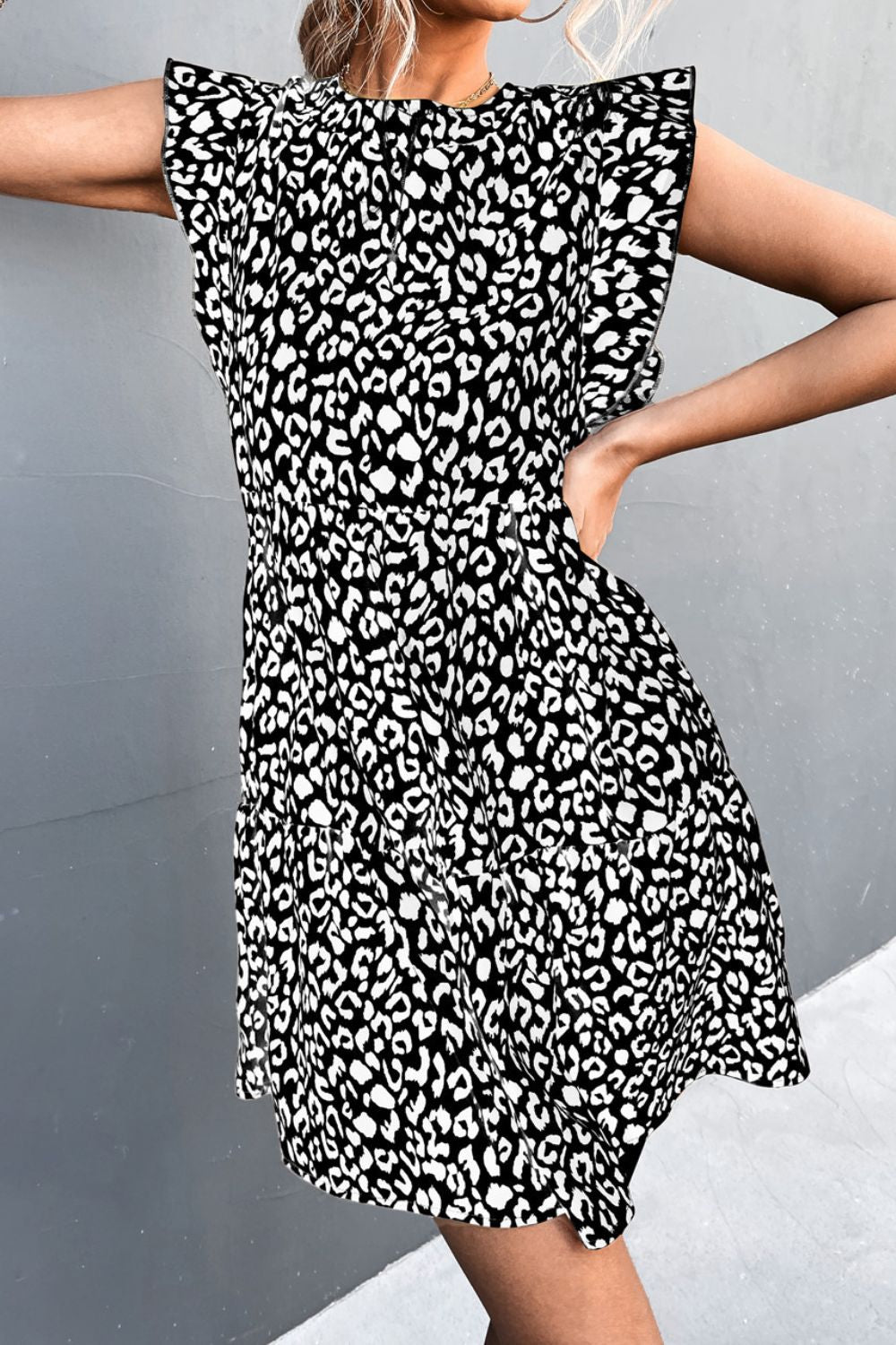 Leopard Round Neck Mini Dress - FunkyPeacockStore (Store description)