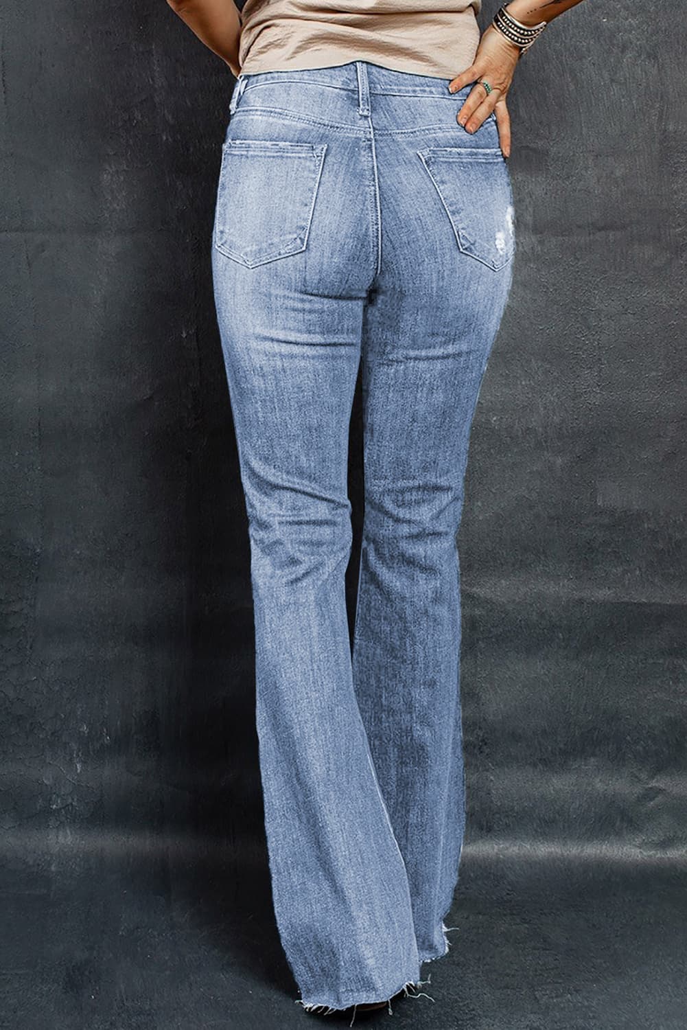 Distressed Raw Hem Flare Jeans - FunkyPeacockStore (Store description)