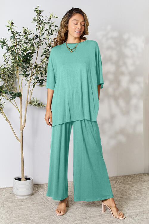 Double Take Full Size Round Neck Slit Top and Pants Set - FunkyPeacockStore (Store description)