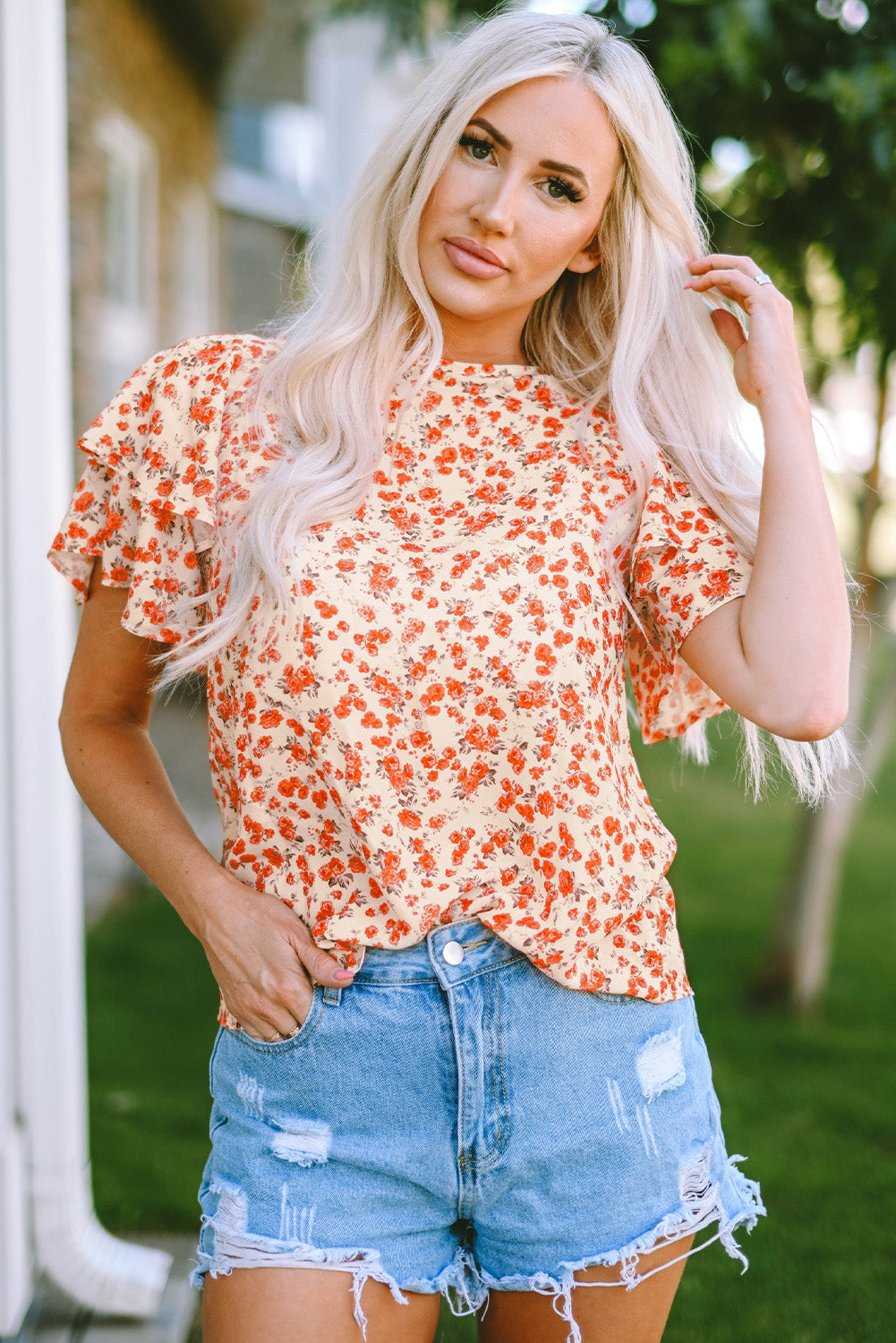 Floral Round Neck Flutter Sleeve Blouse - FunkyPeacockStore (Store description)