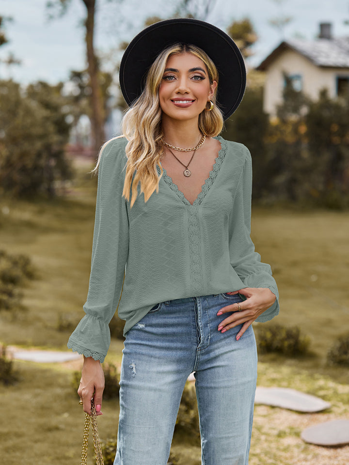 V-Neck Flounce Sleeve Blouse - FunkyPeacockStore (Store description)