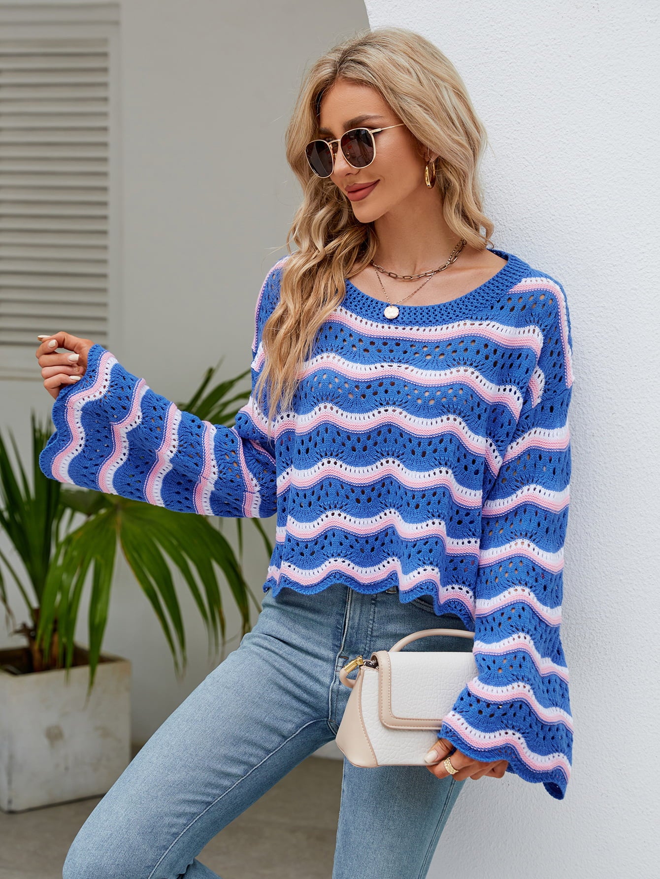 Round Neck Openwork Flare Sleeve Knit Top - FunkyPeacockStore (Store description)